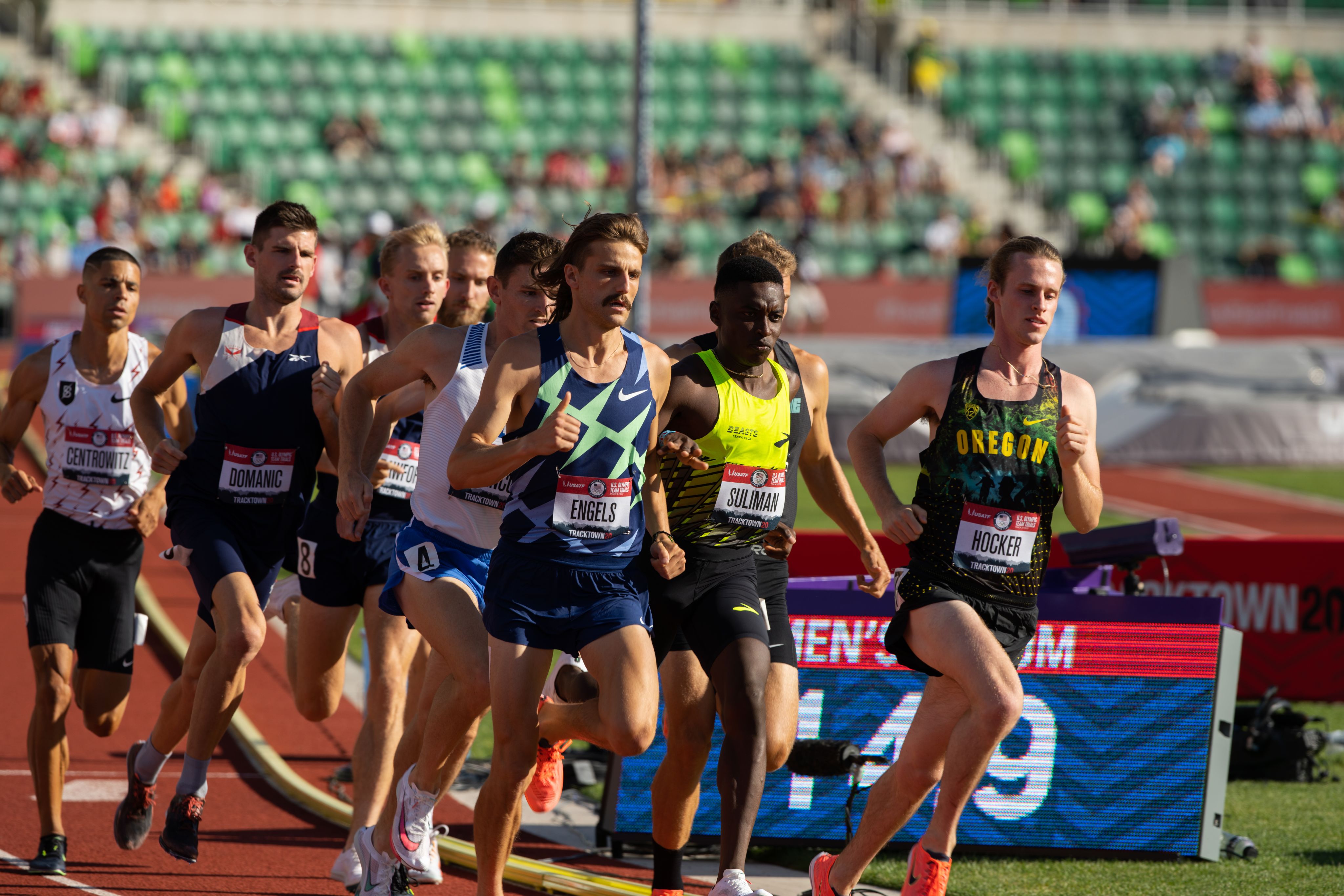 Close-up of several athletes running on the track at Hayward Field.