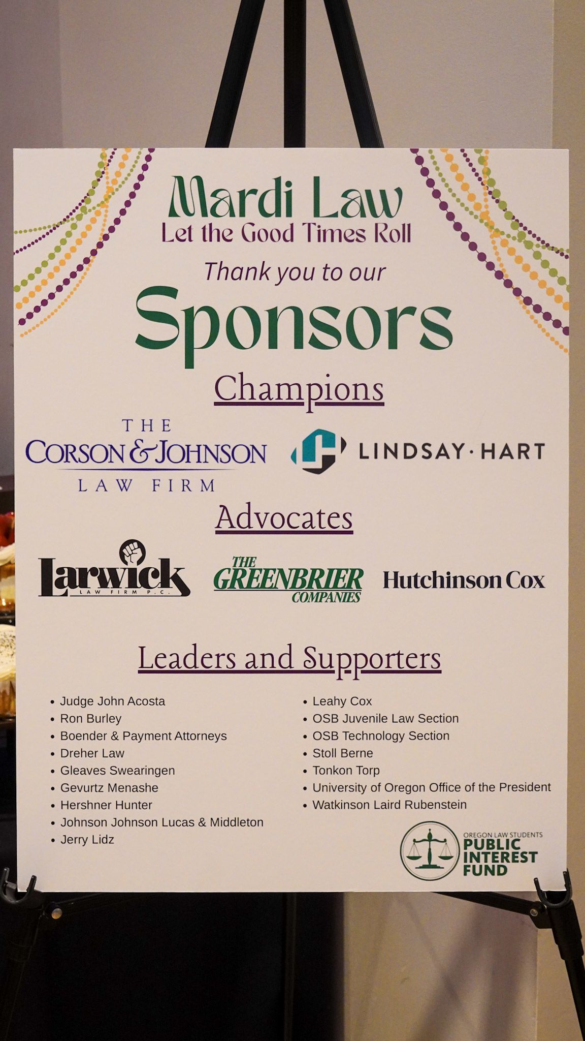 Sign listing the OLSPIF Sponsors.  Including Corson & Johnson, Lindsay Hart, Larwich, Greenbrier, Hutchinson Cox and more. 