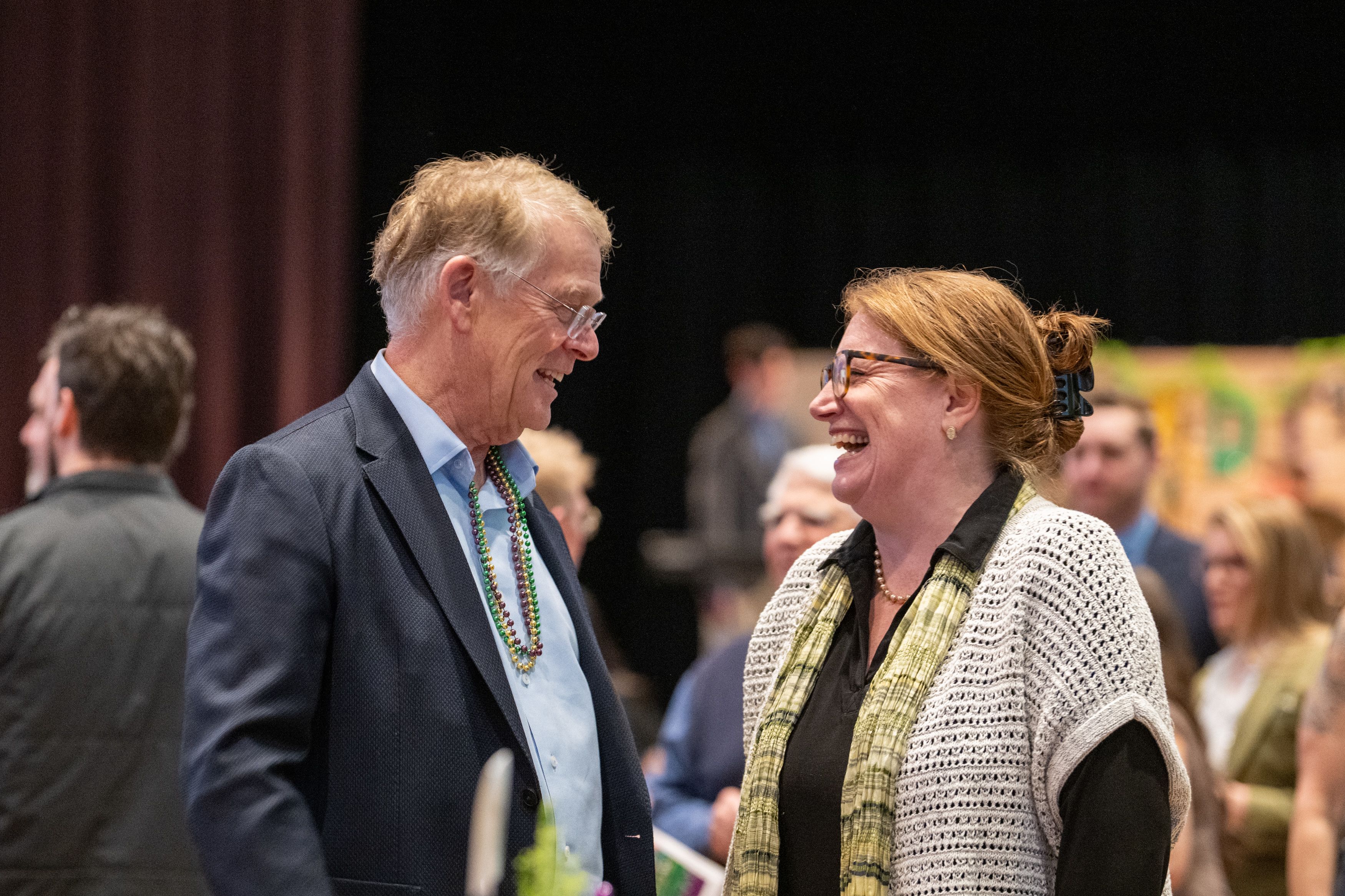 Faculty member Professor Adell Amos laughing.