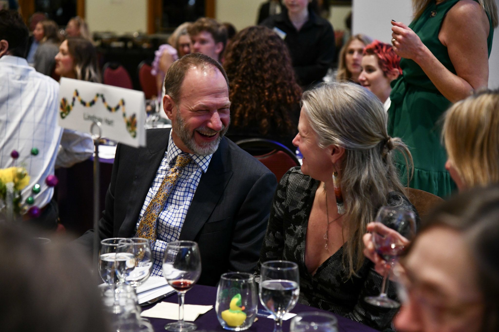 Man and Woman smiling at each other. 